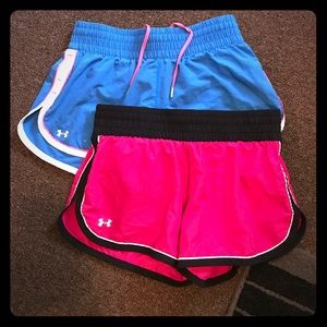 Two pairs under armour running shorts