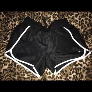 Black and white running shorts