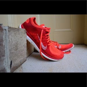 Orange running shoes.