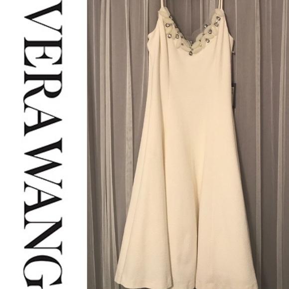 Vera Wang Dresses & Skirts - NWT White Vera Wang dress with beaded neckline