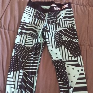 Light blue, patterned Nike pros