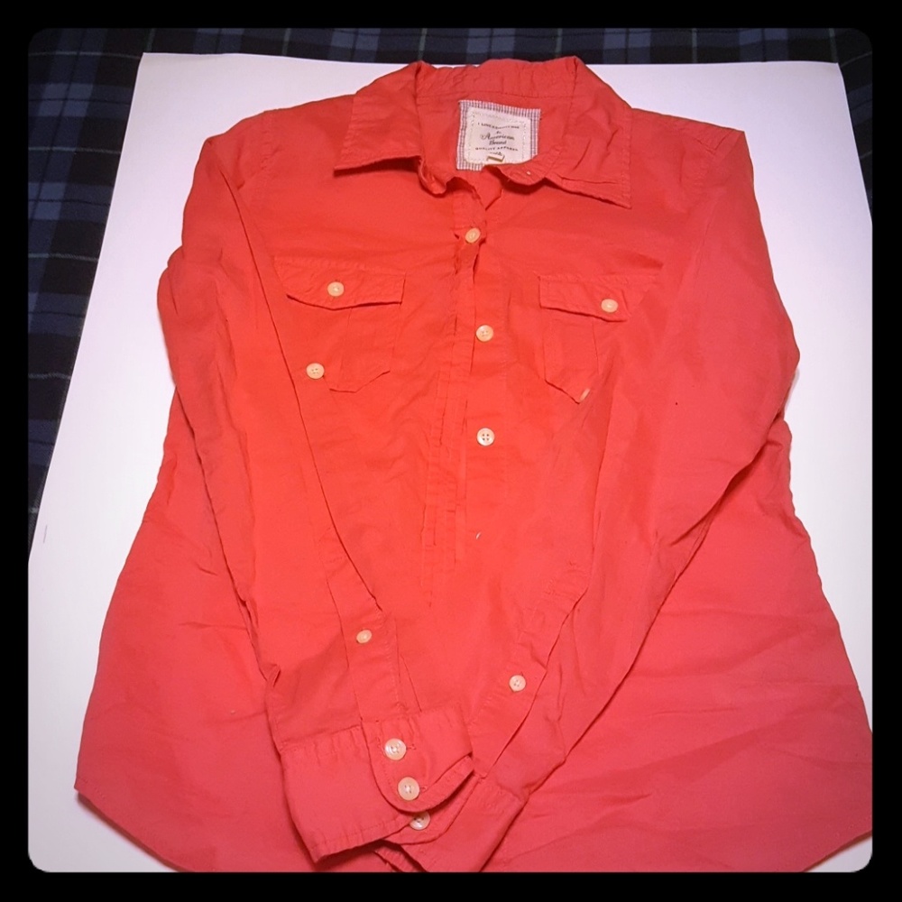 A Pink Button Up Top