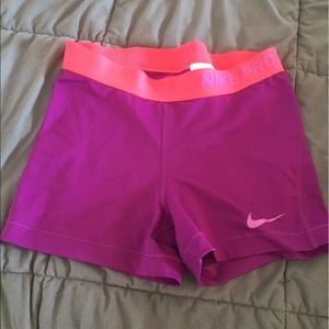 Pink/purple Nike pros