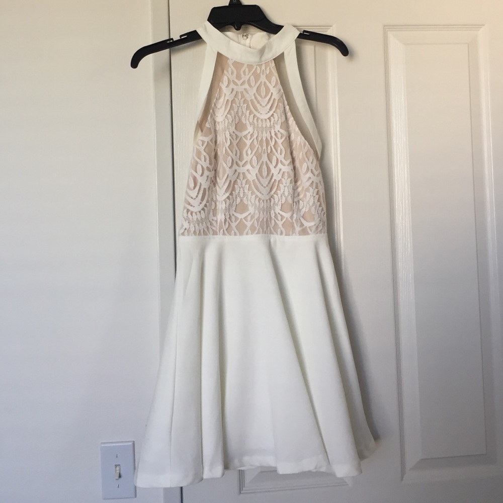 White dress with lace detail.