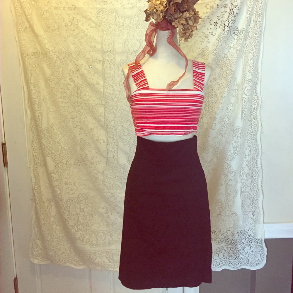 Notice black pencil skirt