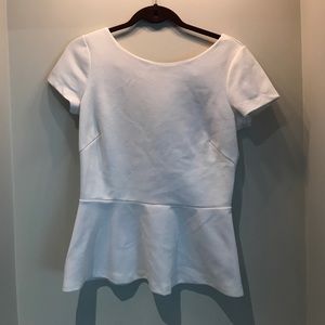 White peplum top