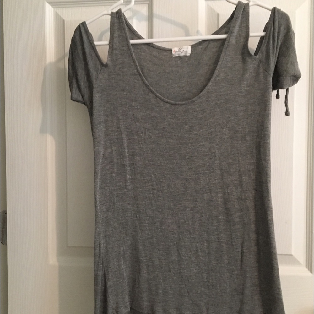 An off the shoulder grey shirt