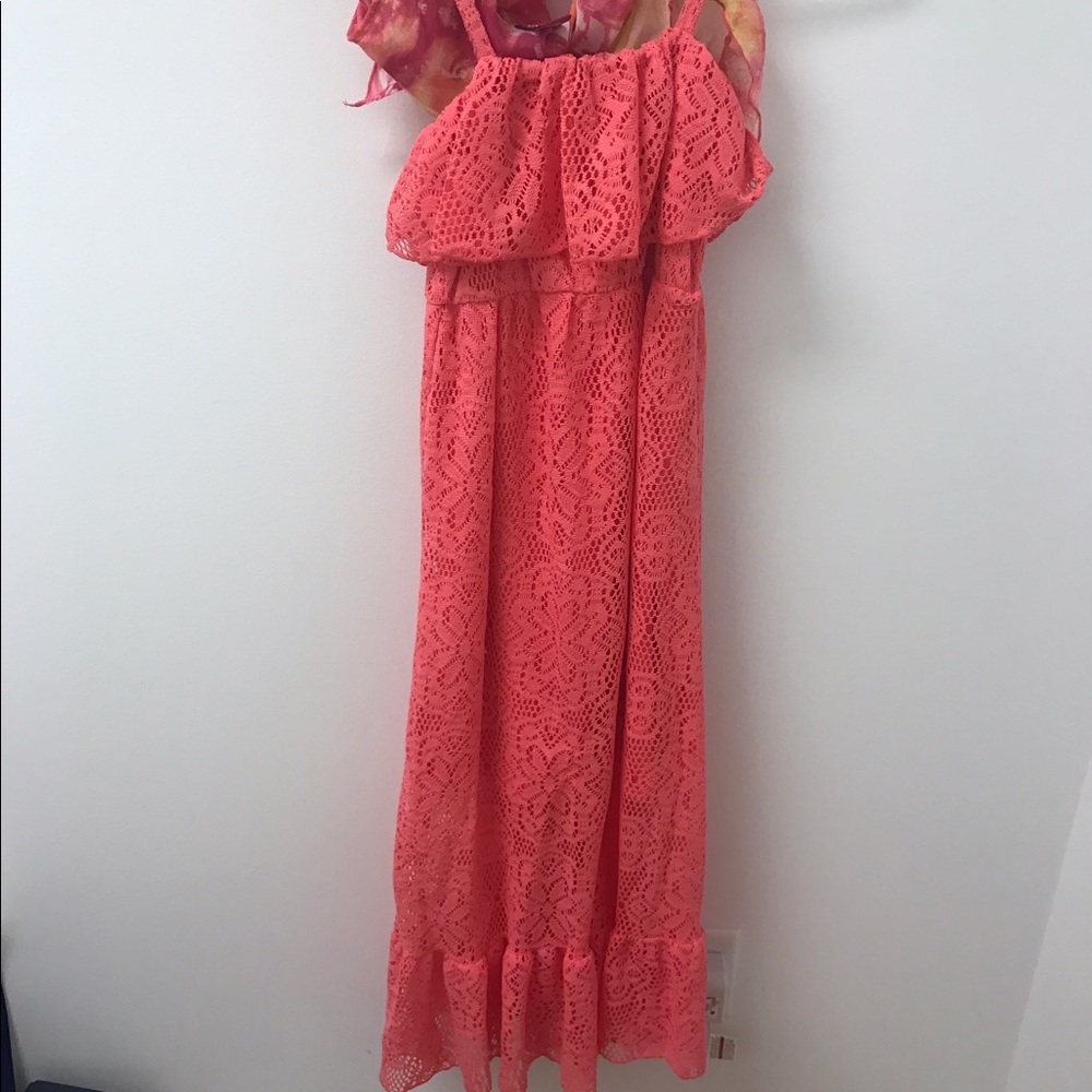 a pretty coral dress with short sleeve half jacket