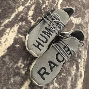 grey human race shoes