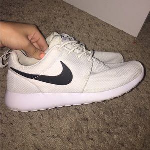 All white Roshe Runs with black Nike Swish