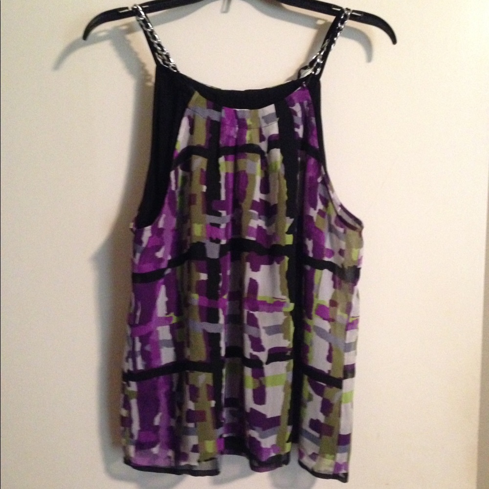 Pretty top silky material with built in black tank