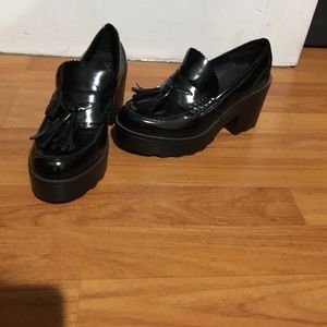 Glossy black platform heels
