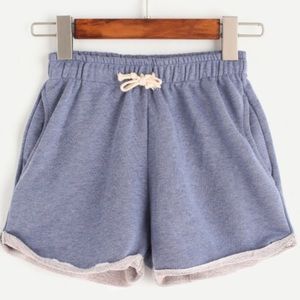 Blue rolled drawstring waist shorts