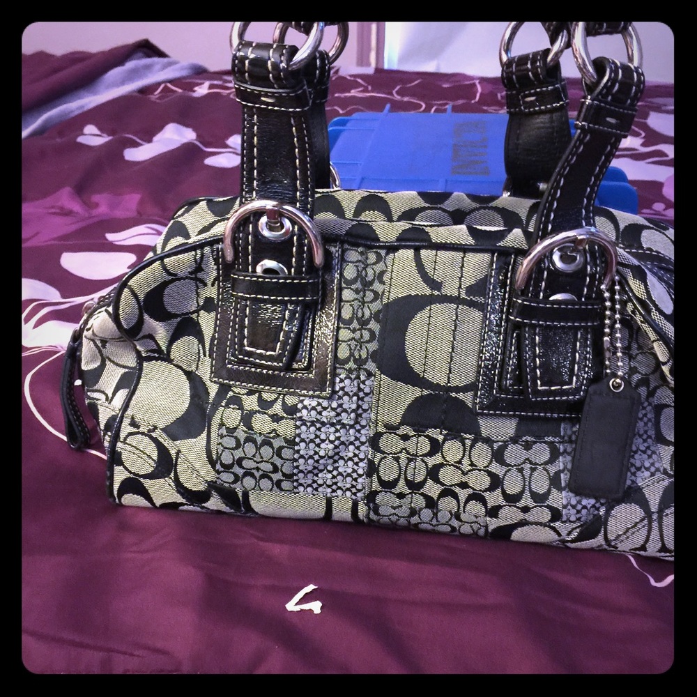 Black and grey Coach satchel