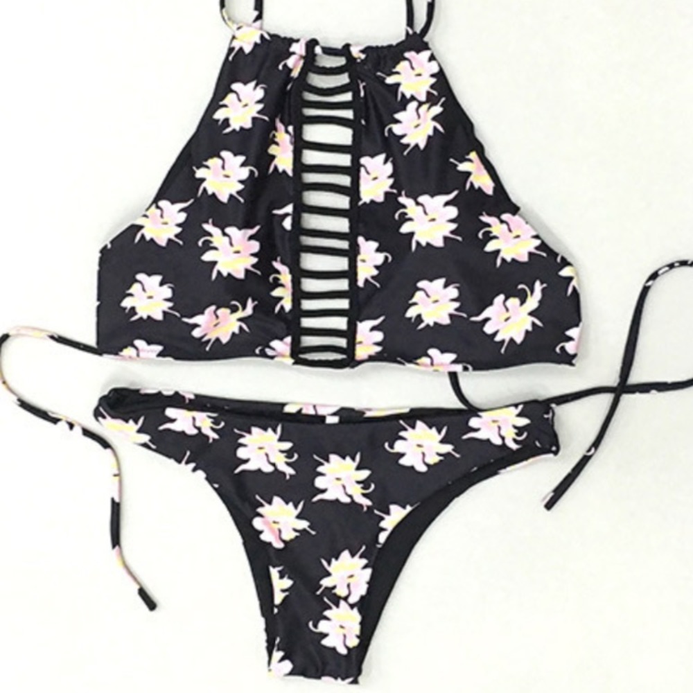 Must have black swimsuit with floral design