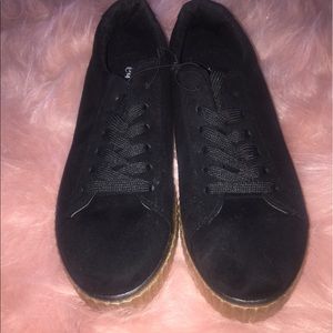Black platform sneakers