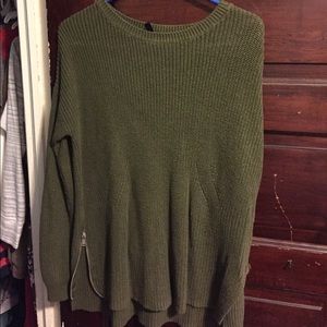 Nice green sweater with the zipper on the side