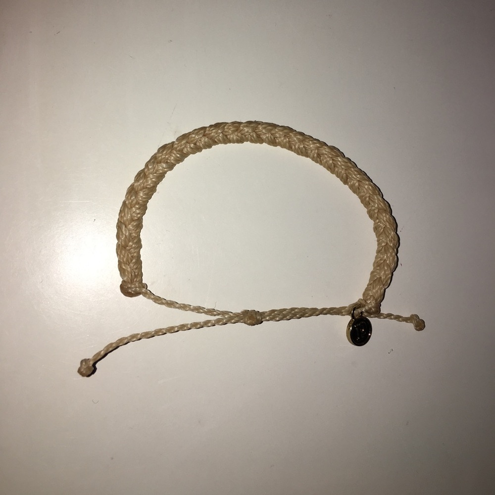 Cream braided Pura Vida bracelet