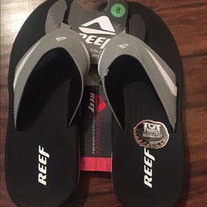 Brand new reef sandals with bottle openers!