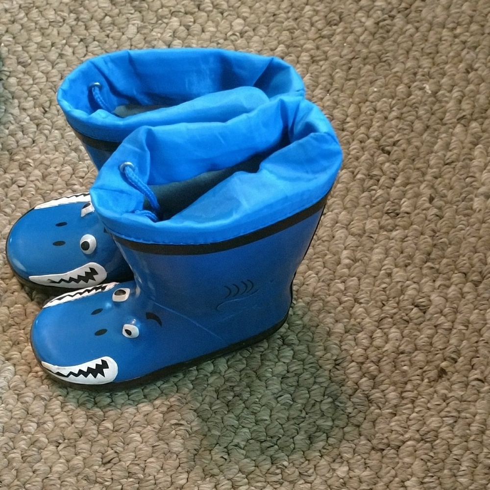 Children boots a little scuffed on the inner sides