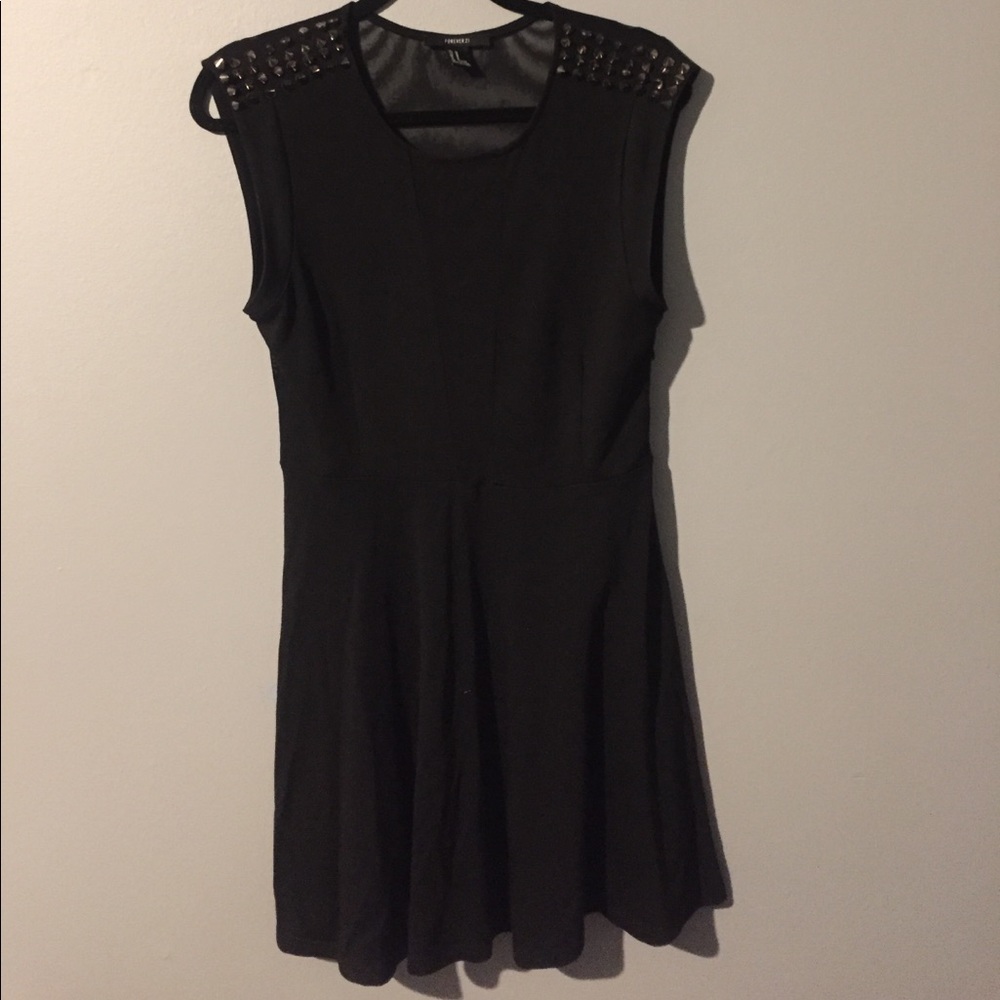 Spiked dress with mesh middle and mesh back