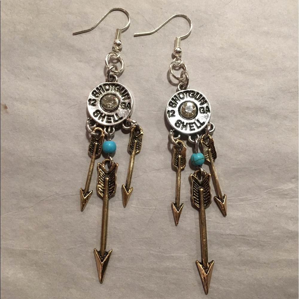 Silver &a gold tone shotgun shell dangle earrings