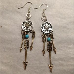 Silver &a gold tone shotgun shell dangle earrings