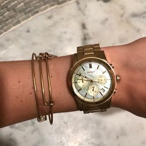 DKNY Watch. Gold Stainless Steel/ Mother of Pearl