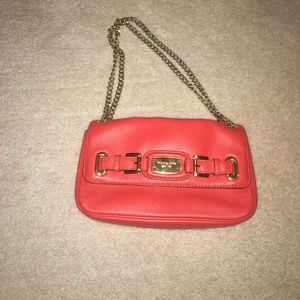 Michael Kors orange purse w gold adjustable chain