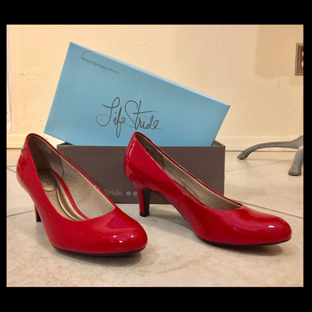Red patent leather pumps