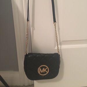 Black Michael Kors crossbody w gold emblem