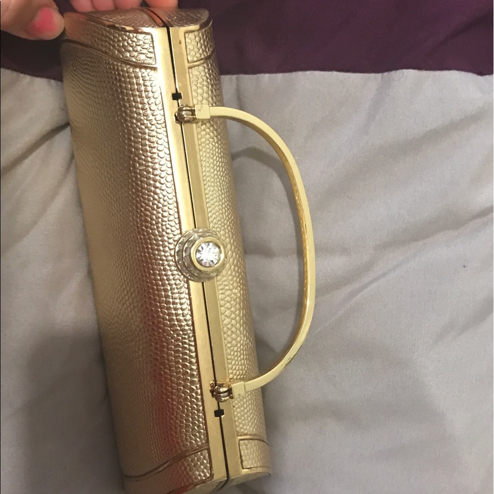 Golden color mini bag , clutch