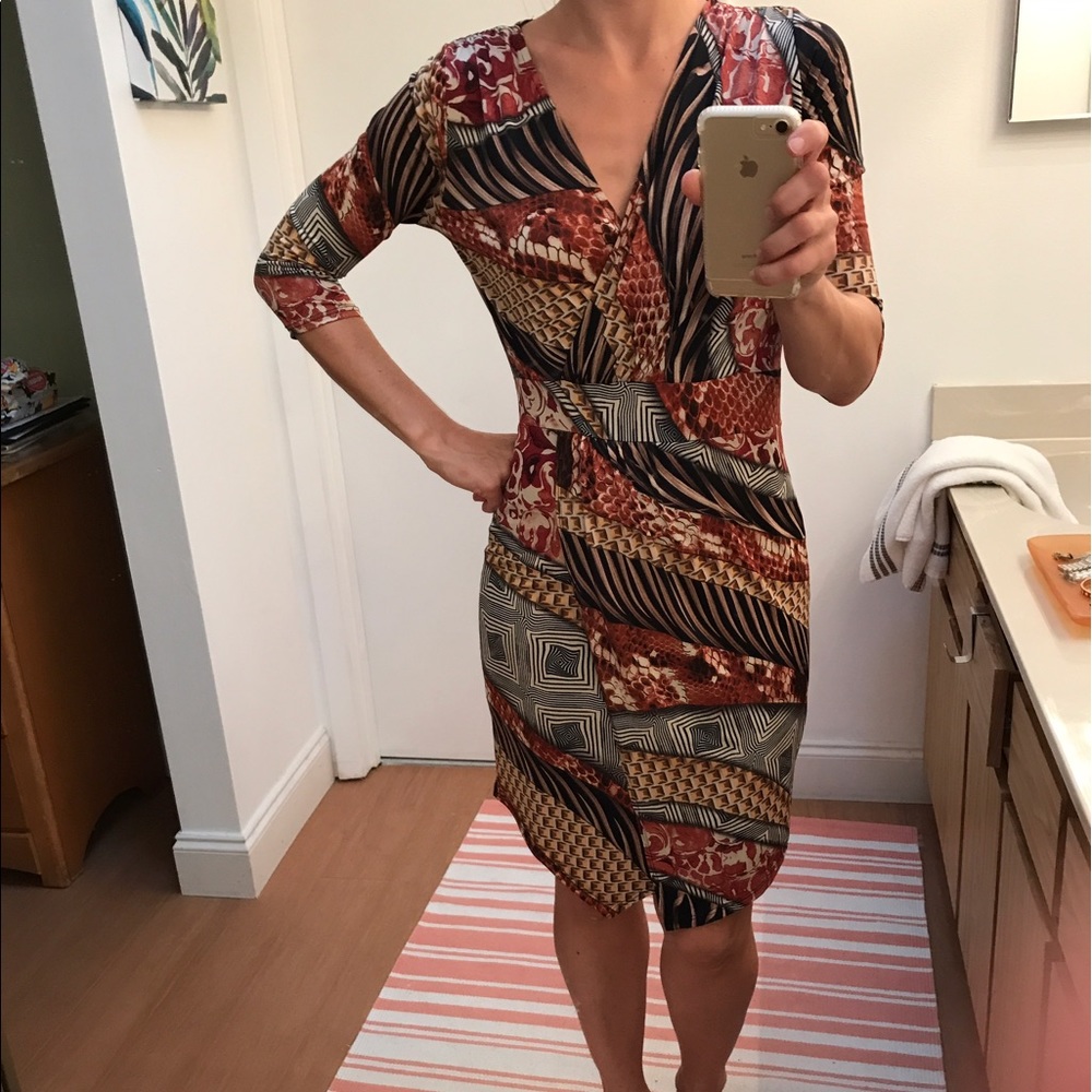 Beautiful form flattering dress. Hides imperfect.