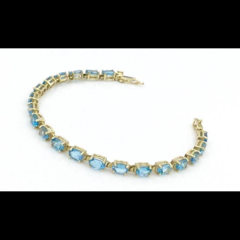 11.22Ct Oval Shape Topaz 14Kt Yellow Gold Bracelet