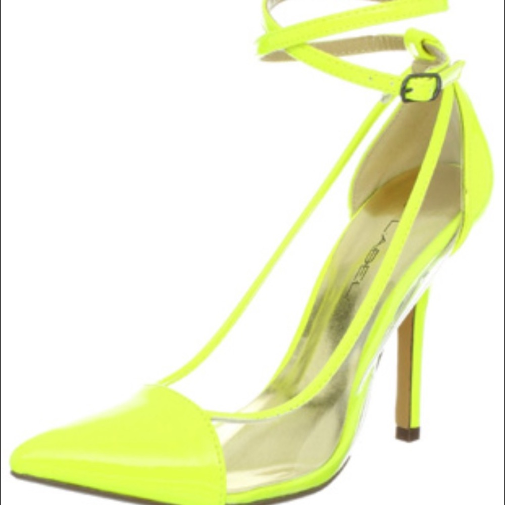Hot pink strap around the ankle clear heels