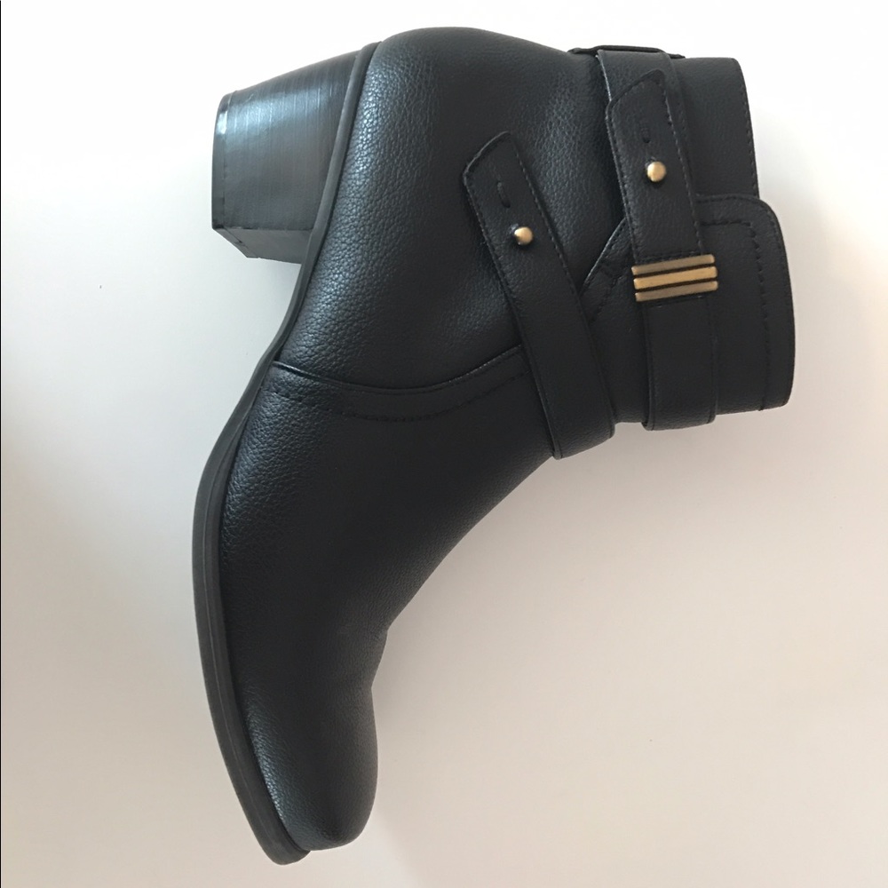 Black wedge ankle boots.