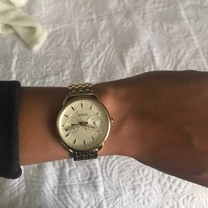 Women's gold Tailor Fossil watch
