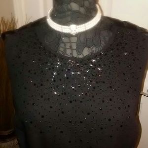 Black Formal full length beaded gown.