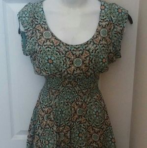 Color print dress that flatters the mid section.