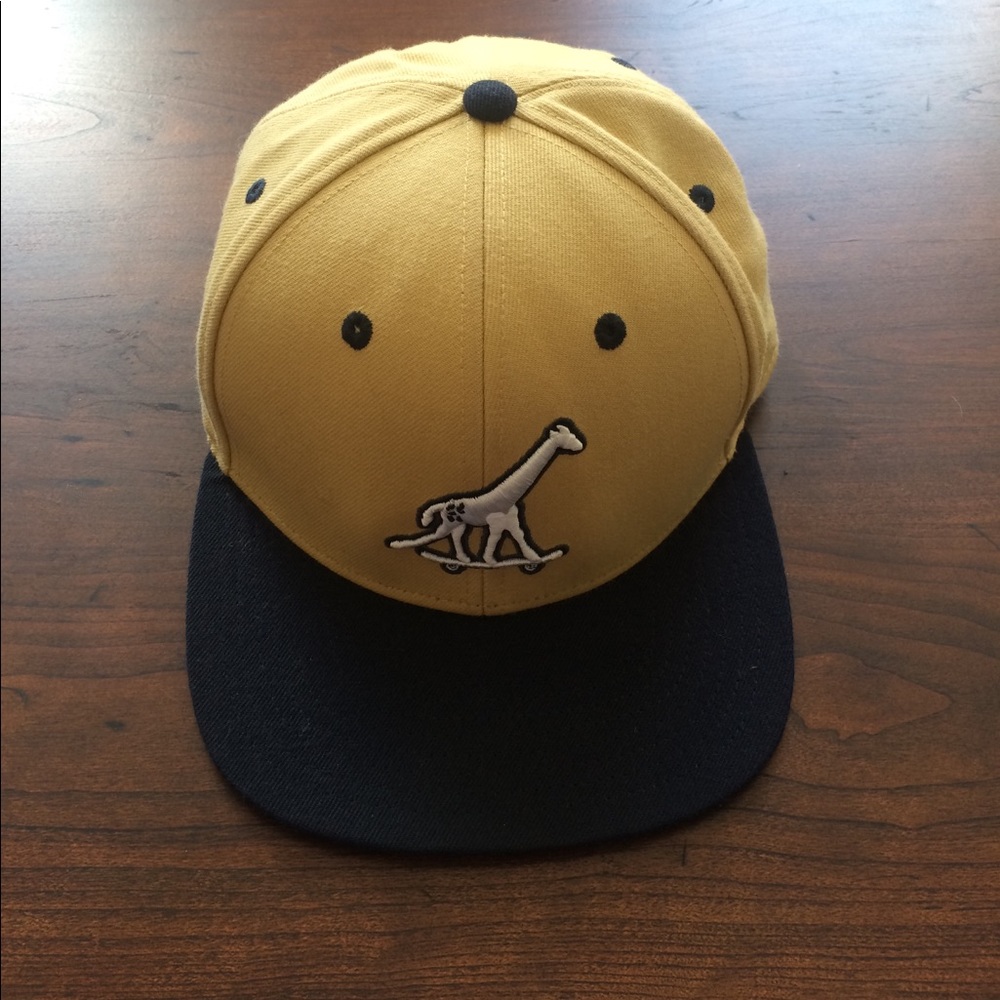 Mustard yellow skateboard giraffe SnapBack
