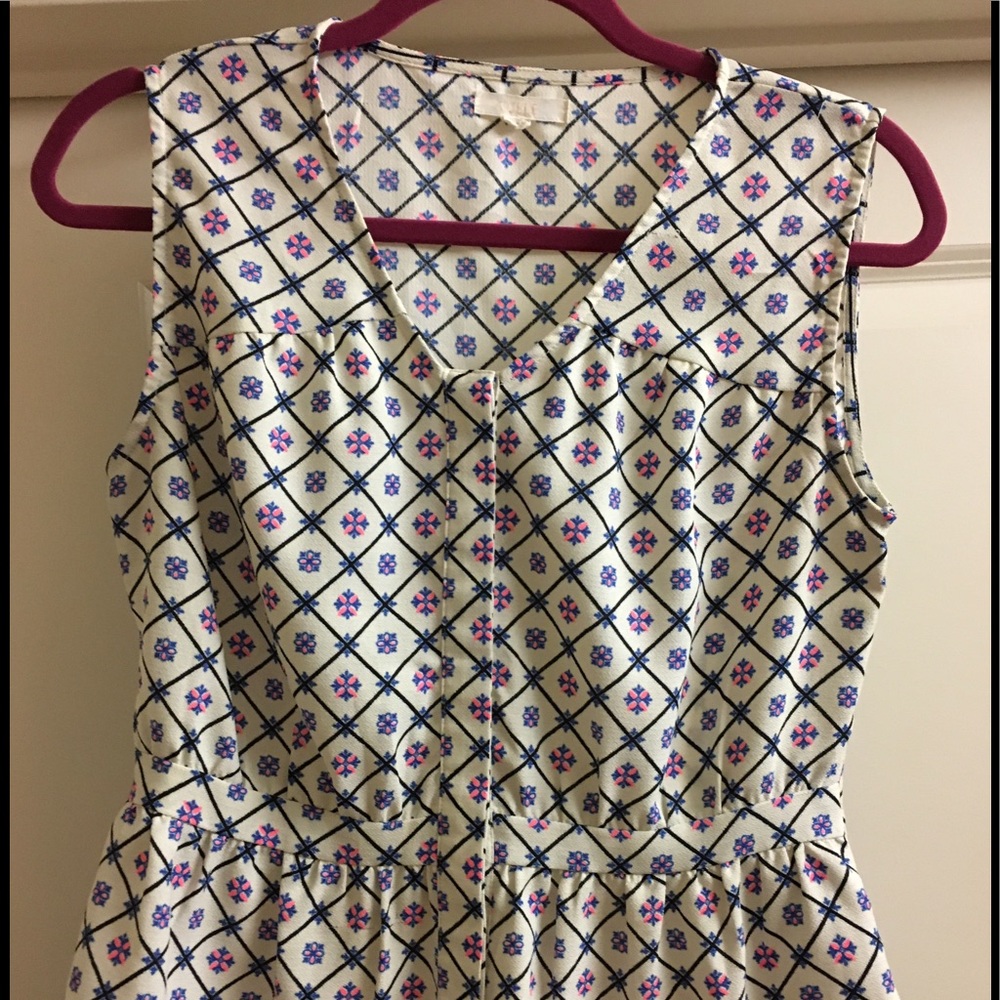 White Sleeveless Top w/ blue/pink/black print (M)
