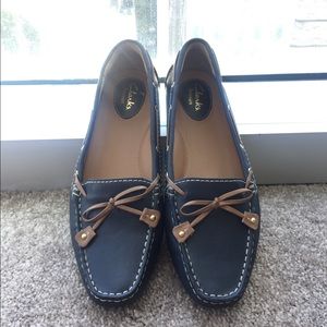 Blue, very comfy clarks, size 8.