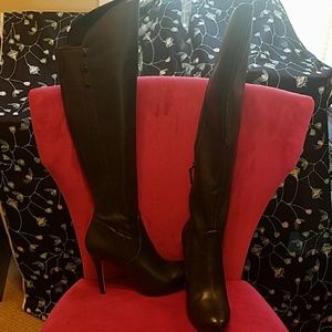 Above knee high heel boots