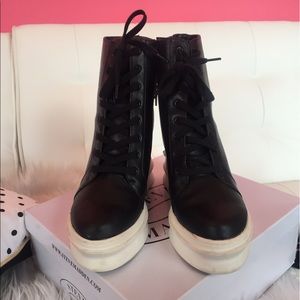 Madden hidden heel black sneakers white sole
