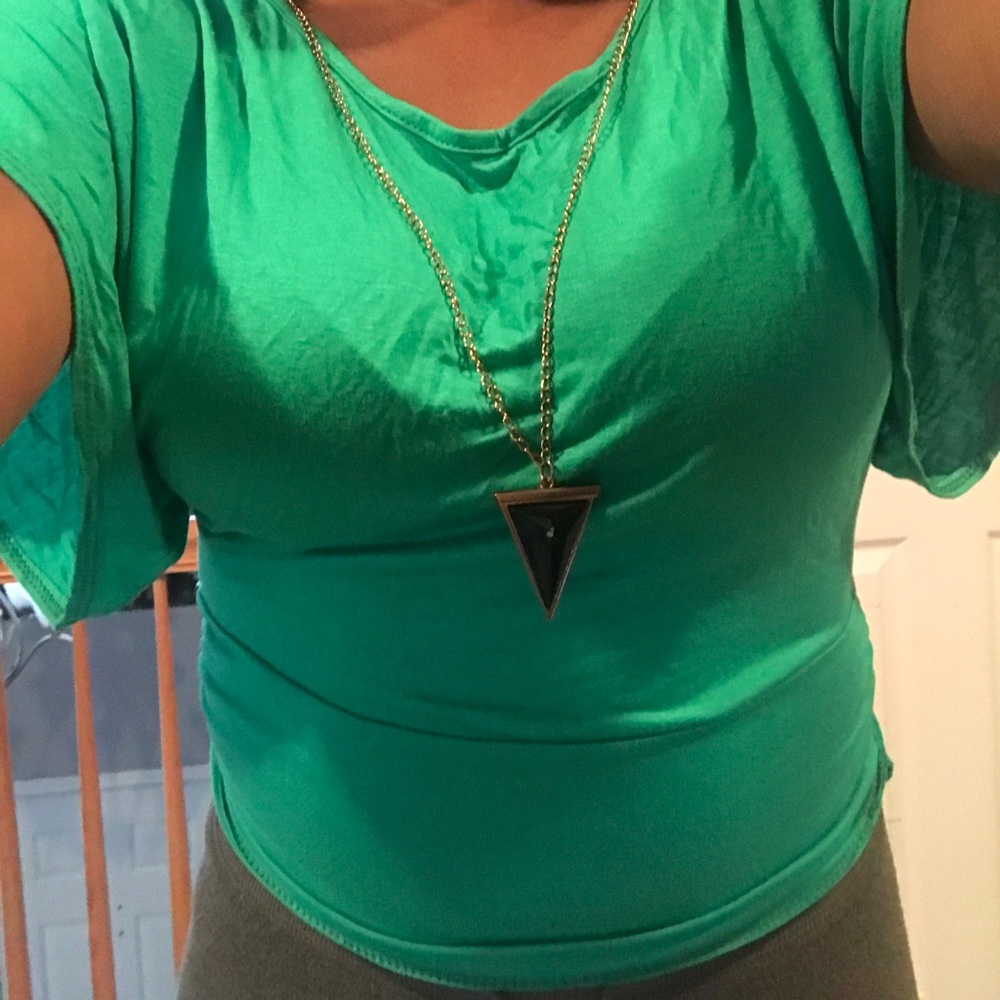Green blouse with necklace