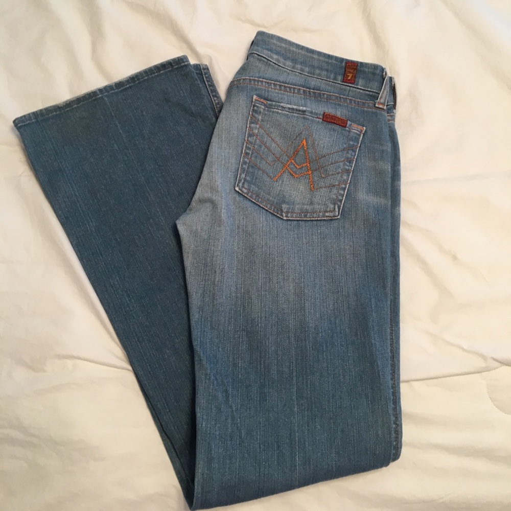 7 for all mankind faded jeans