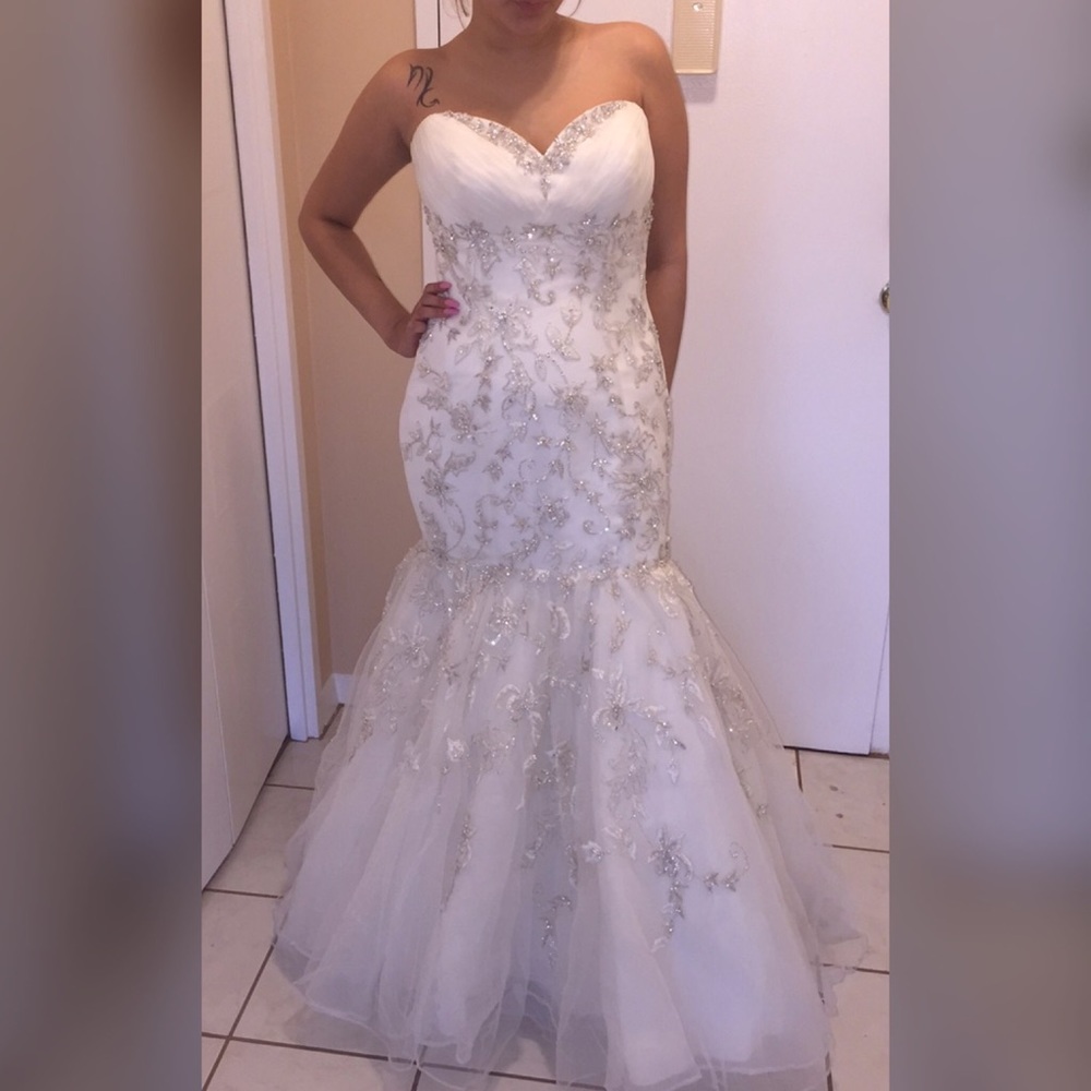 White wedding dress w/ beaded details and gloves.