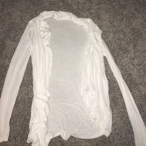 White long sleeve cardigan with pockets.