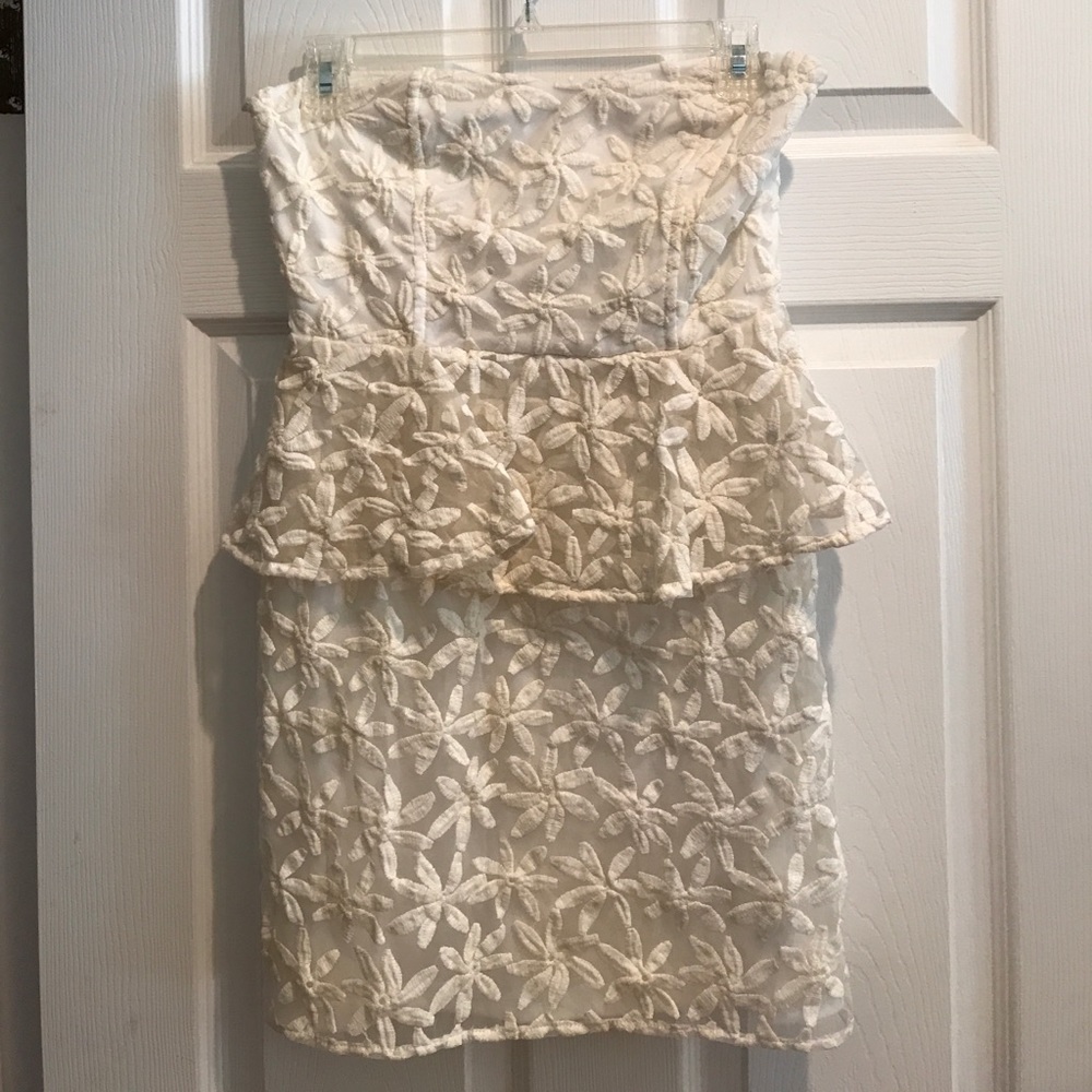 Cream colored floral lace peplum dress