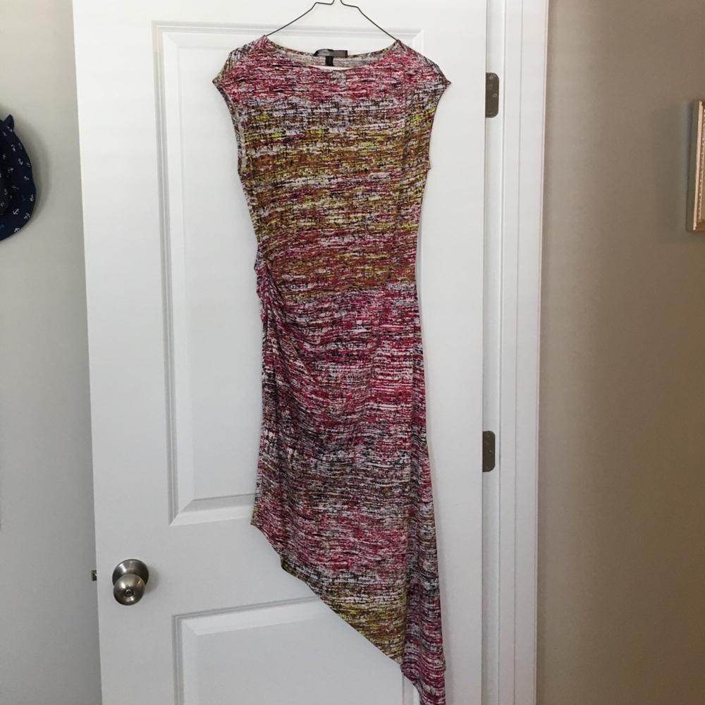 Asymmetrical body con dress.